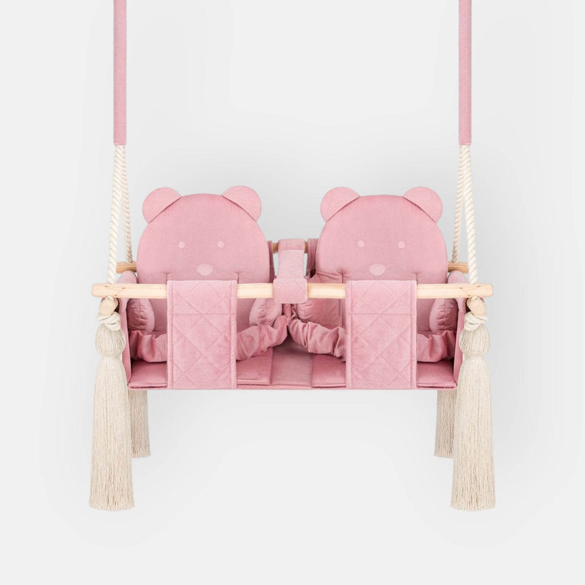 Balançoire double jumeaux en velours rose, vue de face : double siège, barre en bois et pompons