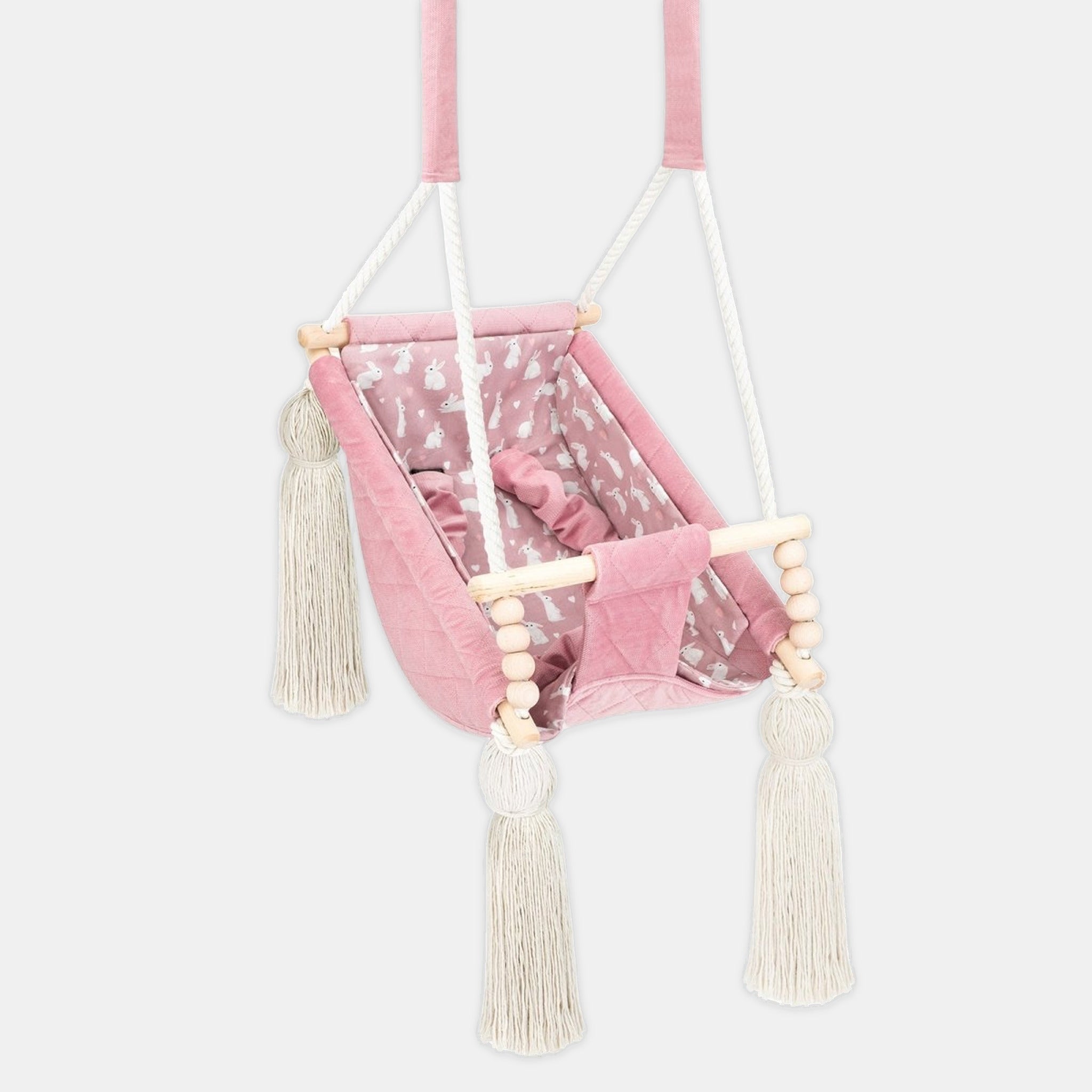 Hamac bébé suspendu en velours rose, vue de face avec insert en coton amovible