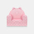 Fauteuil bébé ourson en velours rose, vue de face sur fond clair